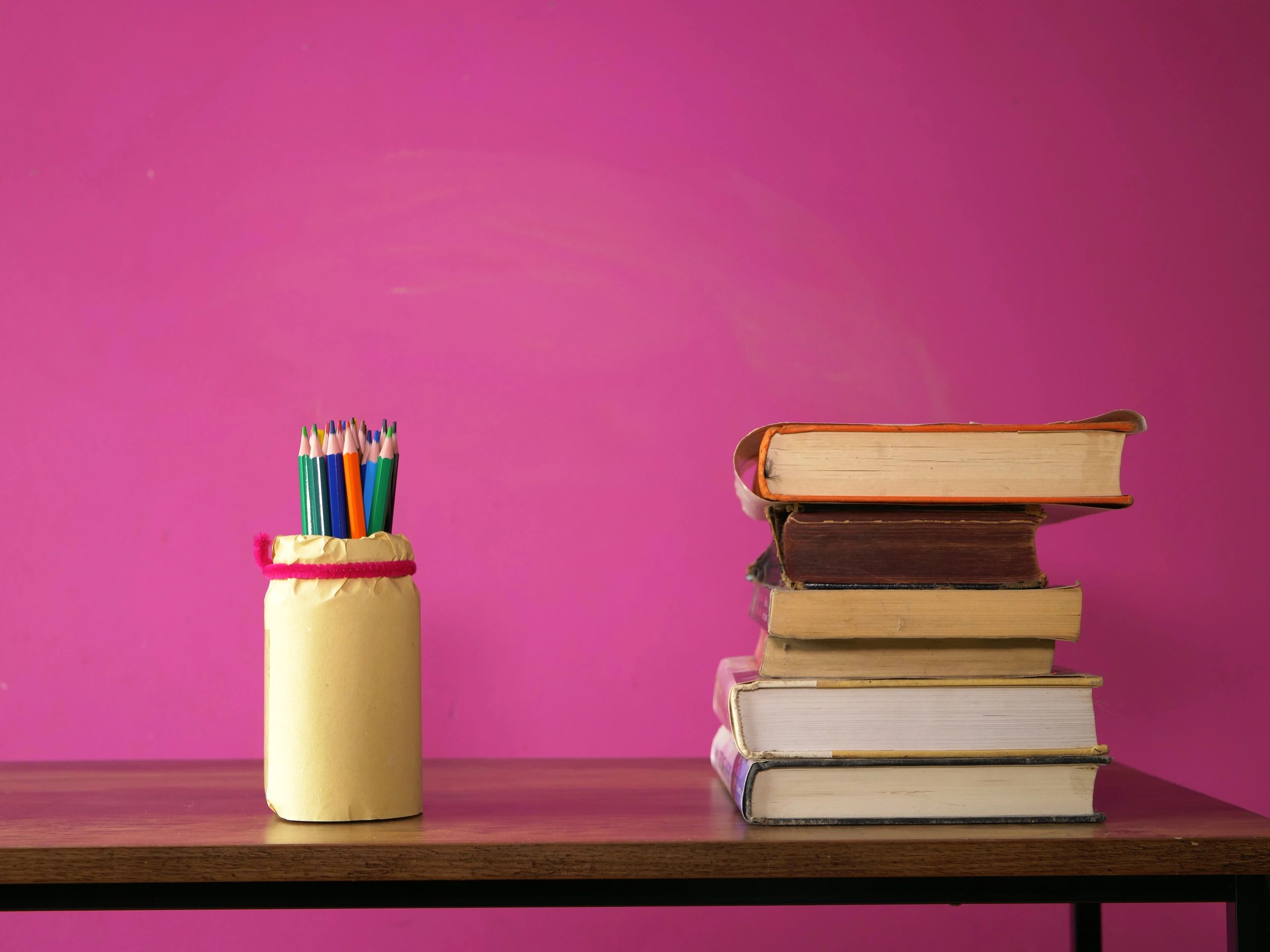 Books and pencils on a cozy desk
