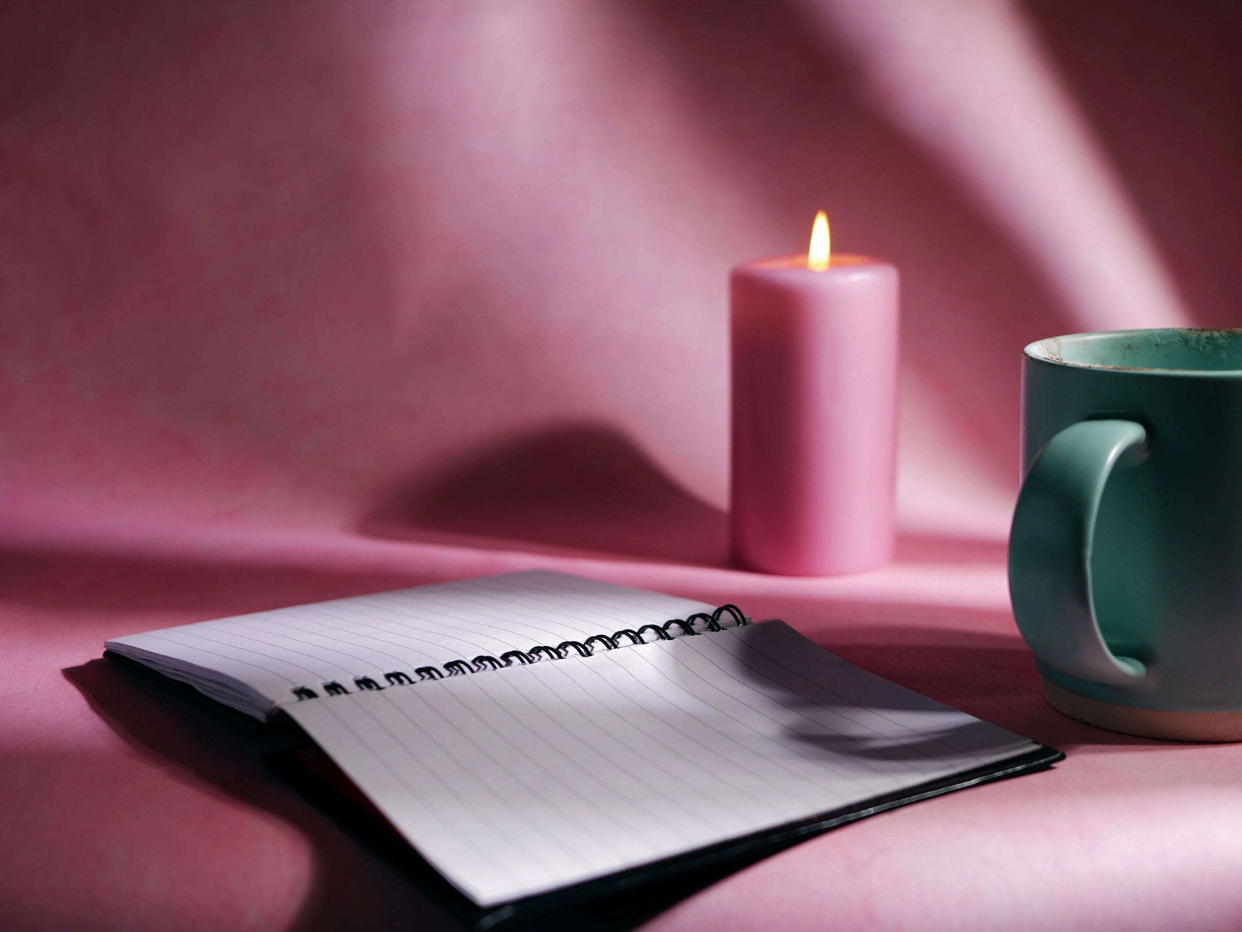 Journal with a warm drink for a cozy reading moment